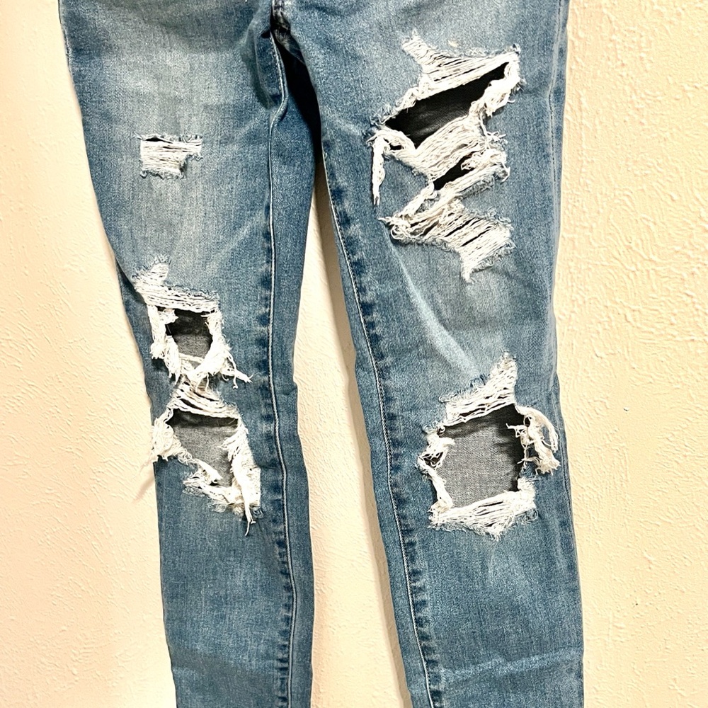 Distressed Blue Jeans